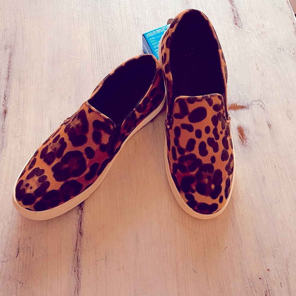 Ladies slip on animal print sneakers like new size 71/2